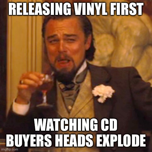 Vinyl vs CD | RELEASING VINYL FIRST; WATCHING CD BUYERS HEADS EXPLODE | image tagged in memes,laughing leo,playing vinyl records | made w/ Imgflip meme maker