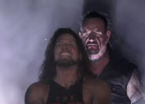 Undertaker behind AJ Styles Blank Meme Template