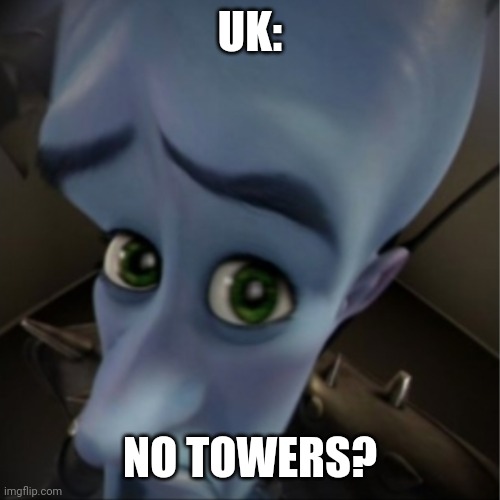 Megamind peeking | UK: NO TOWERS? | image tagged in megamind peeking | made w/ Imgflip meme maker