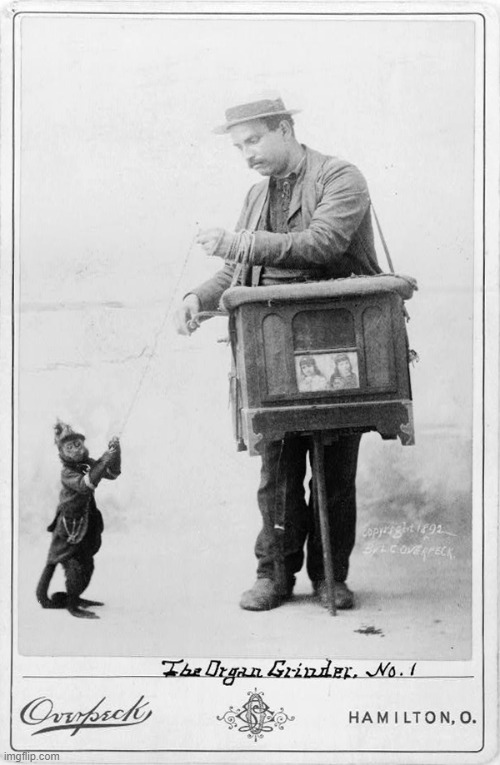 Organ Grinder w Monkey | image tagged in organ grinder w monkey | made w/ Imgflip meme maker