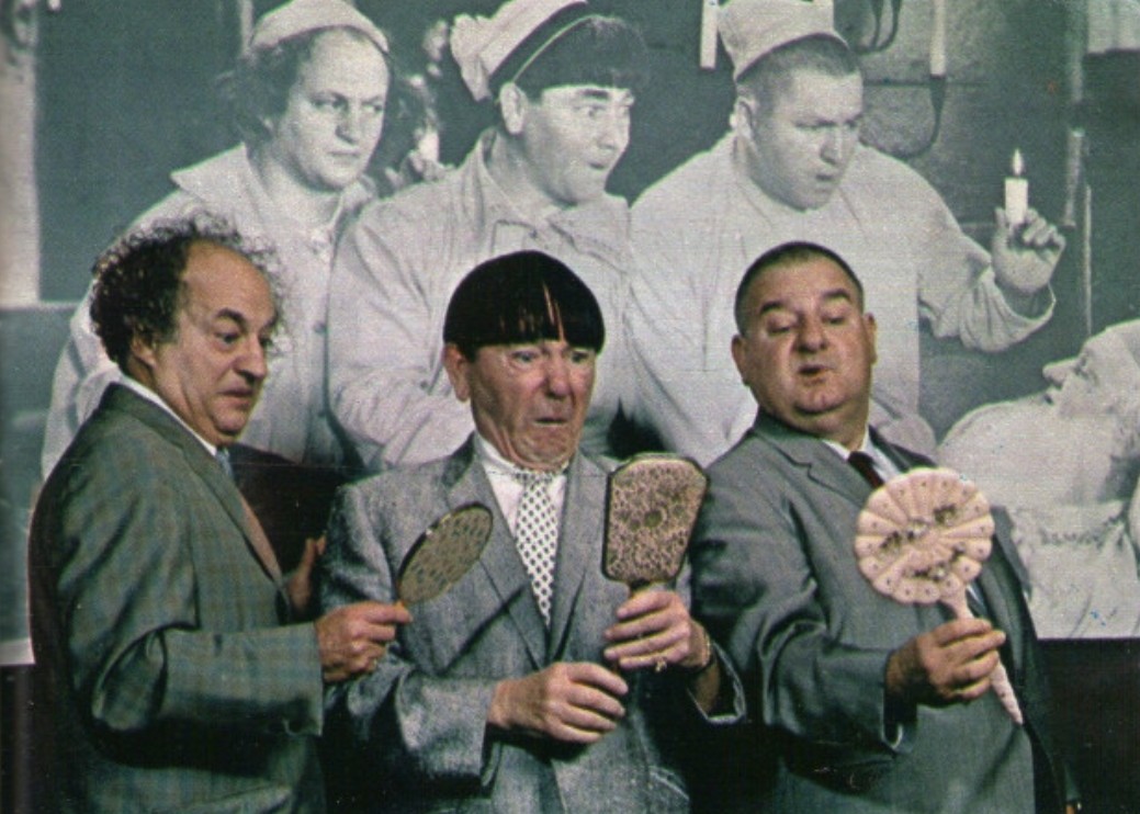 The Three Stooges looking at a picture Blank Meme Template