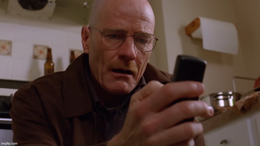 Walter White on his Phone | image tagged in walter white on his phone | made w/ Imgflip meme maker