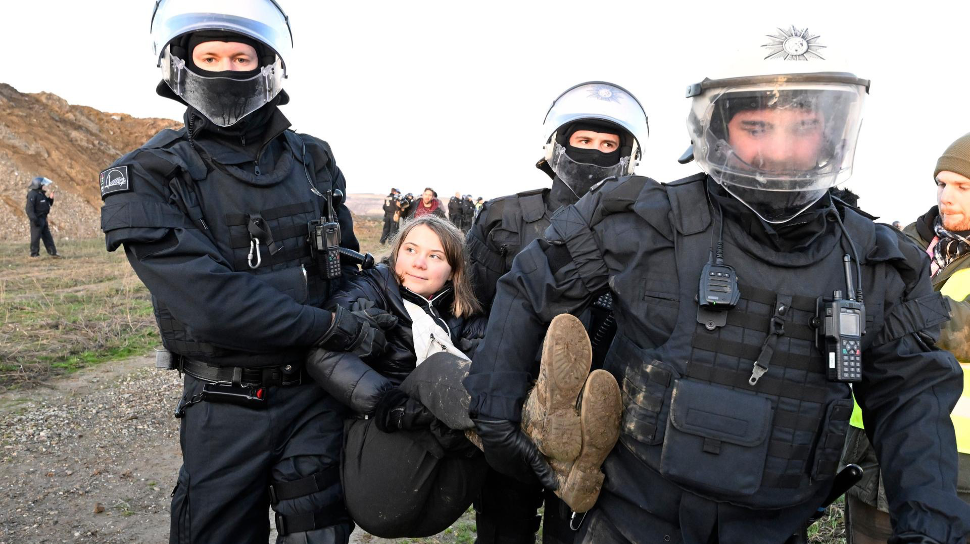 High Quality Greta Thumberg carried by german police Blank Meme Template