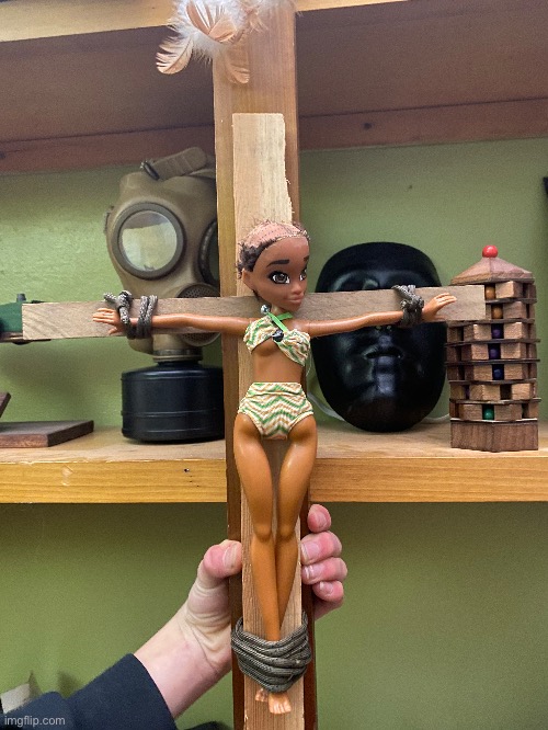 me n my friend crucified a barbie doll (he’s holding it) | image tagged in barbie,doll,funny | made w/ Imgflip meme maker