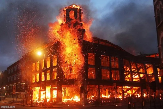 The city of Schofield, Resorteria. Most buildings are burning. | made w/ Imgflip meme maker