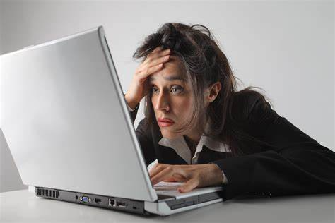 stressed woman at computar Blank Meme Template