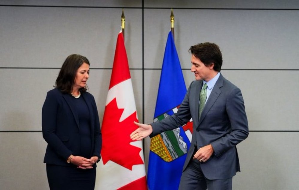 High Quality Danielle Smith Justin Trudeau handshake Blank Meme Template