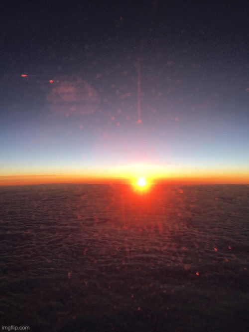 Sunset out of plane window | image tagged in sunset | made w/ Imgflip meme maker