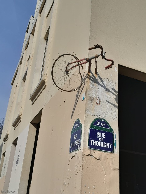 Bicycle stuck in a street of Paris | image tagged in photos | made w/ Imgflip meme maker