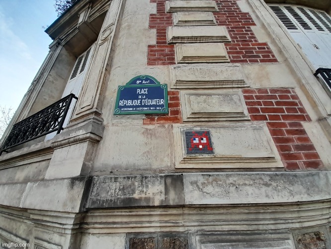 A piece of art by Invader, a French artist that put mosaics all around Paris | image tagged in photos | made w/ Imgflip meme maker