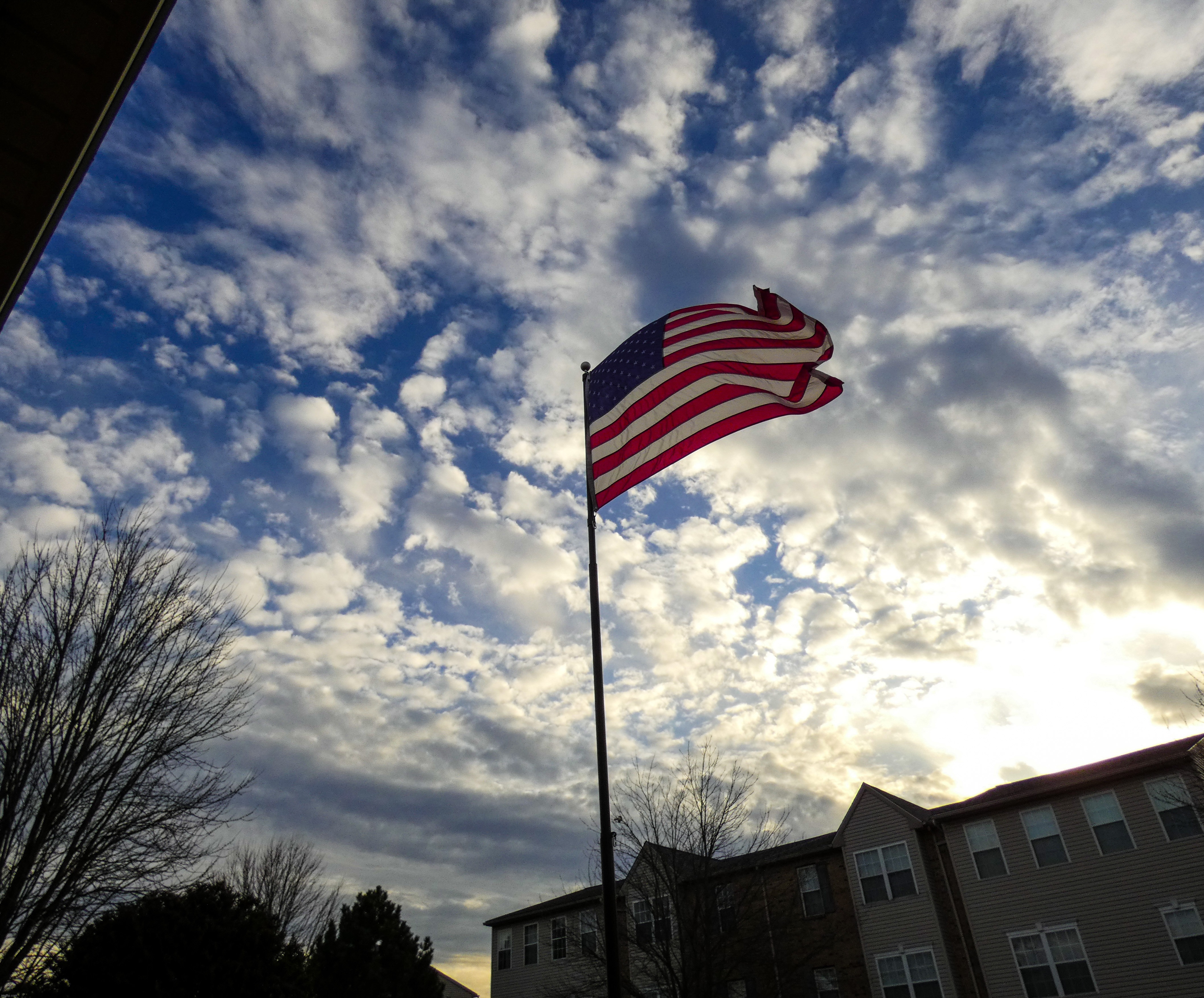 Some cool clouds behind the American Flag | image tagged in share your own photos | made w/ Imgflip meme maker