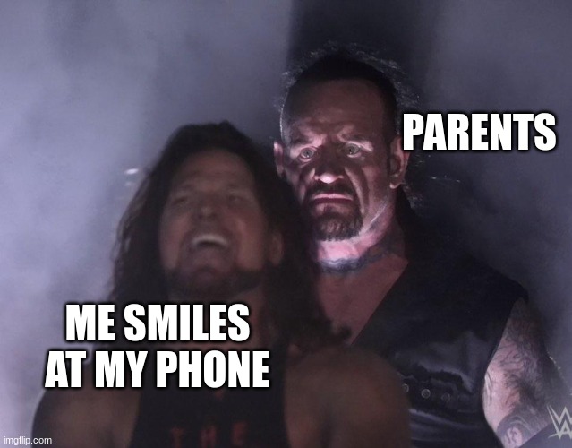 True | PARENTS; ME SMILES AT MY PHONE | image tagged in undertaker,wwe | made w/ Imgflip meme maker