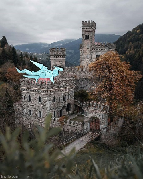I made an origami dragon, took a photo, made the background transparent and put him on a castle | made w/ Imgflip meme maker