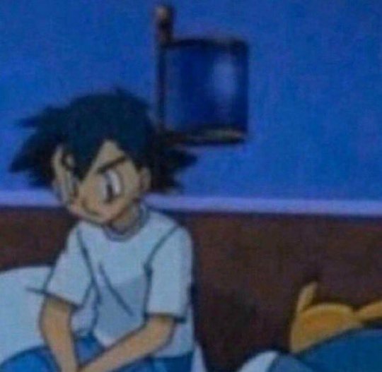 ash ketchum sitting on bed Blank Meme Template