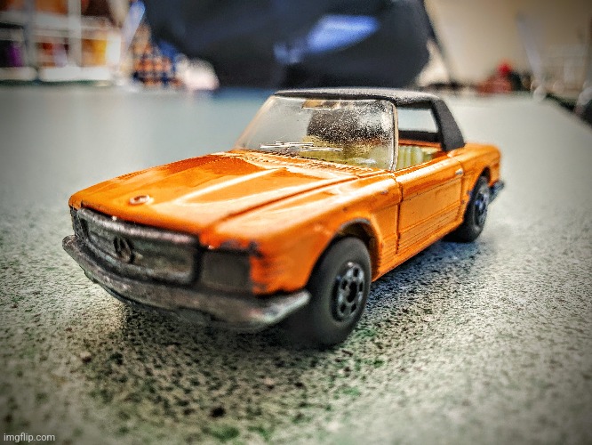 My toy car I took a pic of in school (with effects) | image tagged in car,photography | made w/ Imgflip meme maker