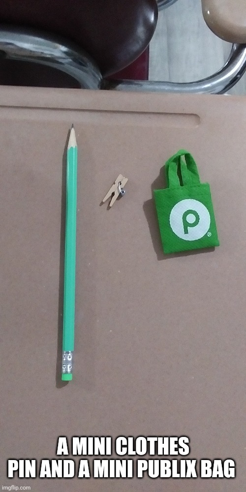 I use the pencil to show y'all how little the mini bag and clothes pin are | A MINI CLOTHES PIN AND A MINI PUBLIX BAG | made w/ Imgflip meme maker