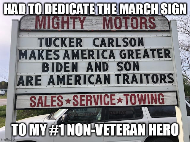 Hero vs zeroes. |  HAD TO DEDICATE THE MARCH SIGN; TO MY #1 NON-VETERAN HERO | image tagged in tucker carlson,biden | made w/ Imgflip meme maker