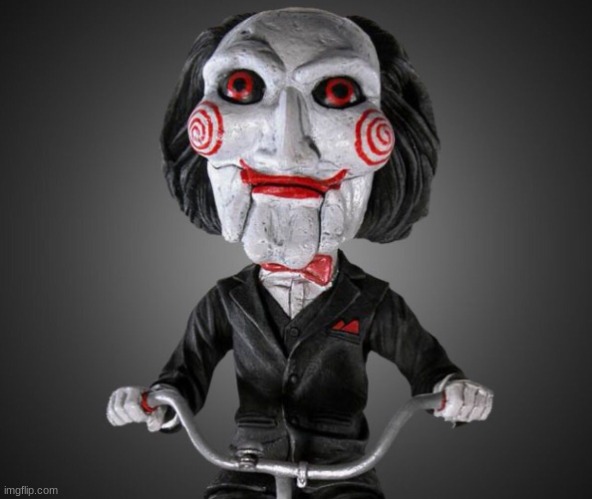 Saw puppet | image tagged in saw puppet | made w/ Imgflip meme maker