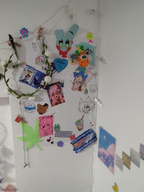 An interesting corner of my wall lol, the drawings are made by me, the rest are memories like the flower crown when I was a flow | made w/ Imgflip meme maker