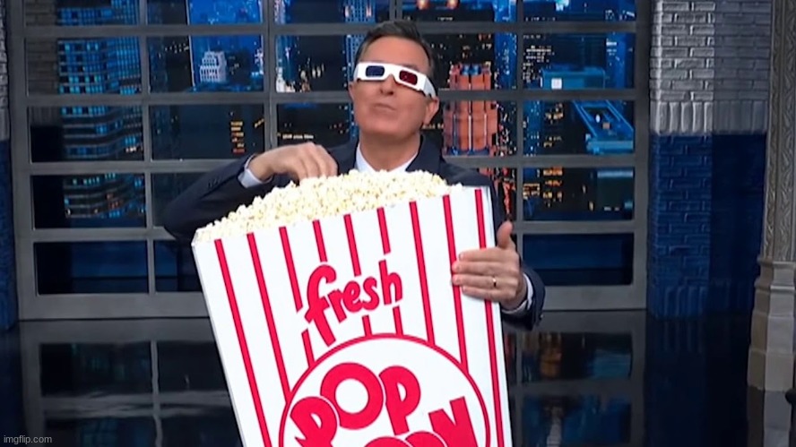 Colbert eating popcorn | image tagged in colbert eating popcorn | made w/ Imgflip meme maker