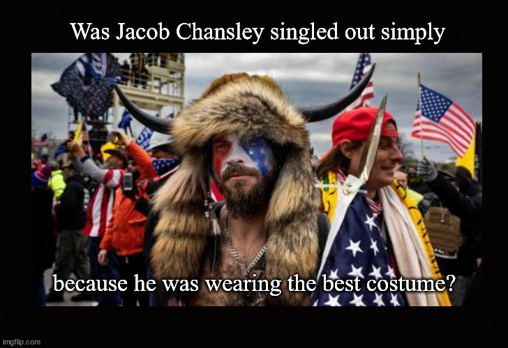 Jacob Chansley dress code violation | Was Jacob Chansley singled out simply; because he was wearing the best costume? | image tagged in jacob chansley,jan 6 riot | made w/ Imgflip meme maker