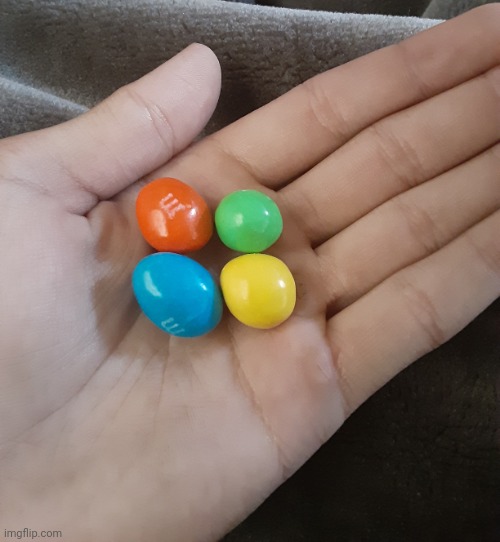 M&m hand | image tagged in m m hand | made w/ Imgflip meme maker