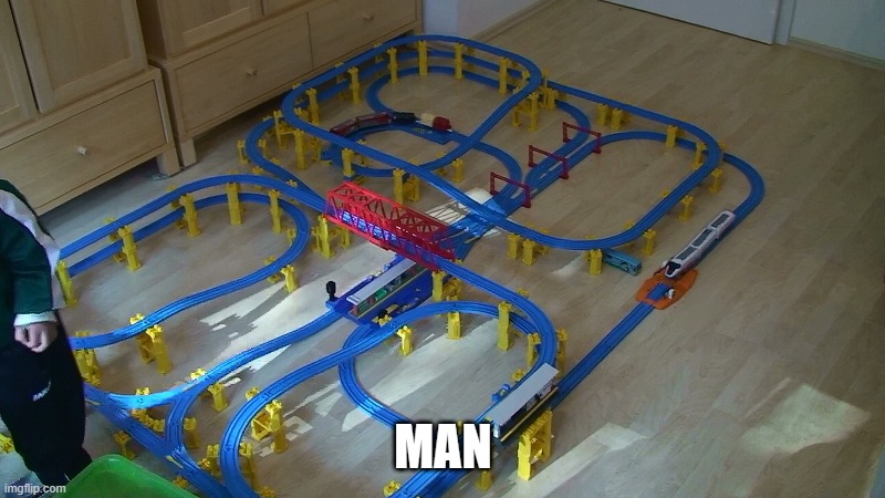 https://imgflip.com/i/7f5u5x?nerp=1728998118#com24538573 | MAN | image tagged in toy train track,foamer,train,train set,toy train | made w/ Imgflip meme maker