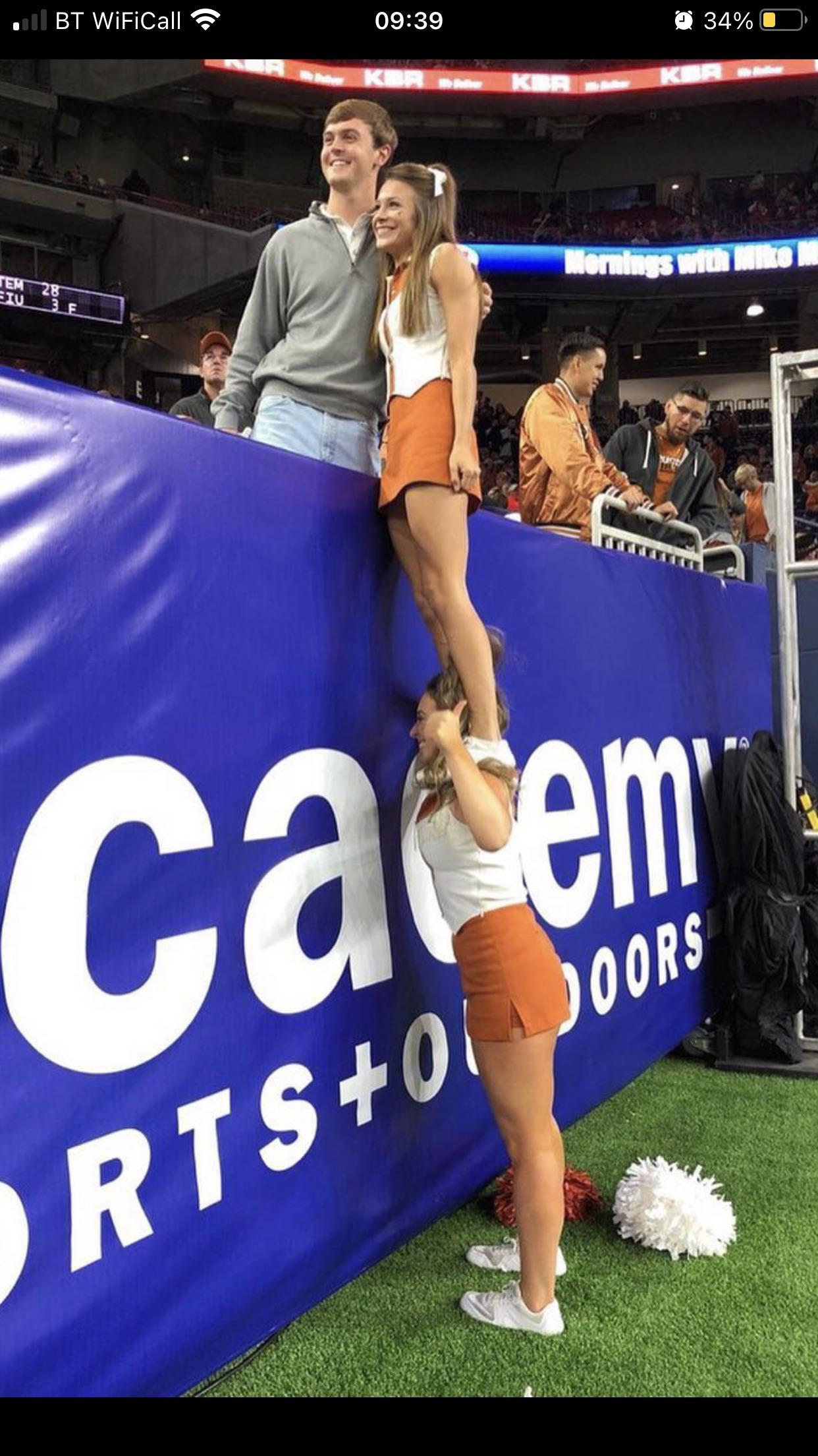 Cheerleader Standing on Shoulder Blank Meme Template