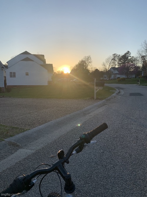 Picture I took while on my bike a couple minutes ago | image tagged in bike sunset picture,sunset,beautiful sunset,why are you reading the tags | made w/ Imgflip meme maker