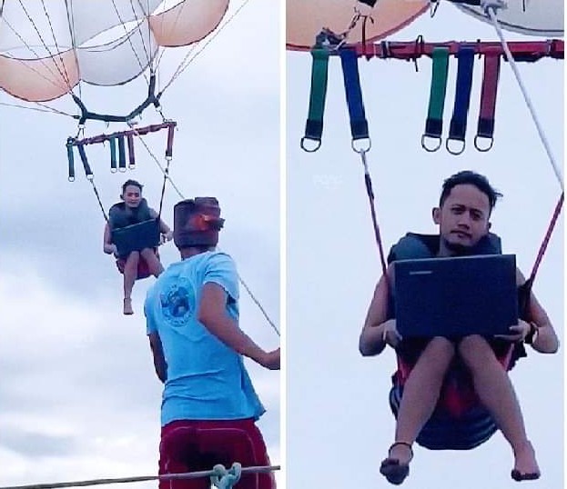 Parasailing with computer Blank Meme Template