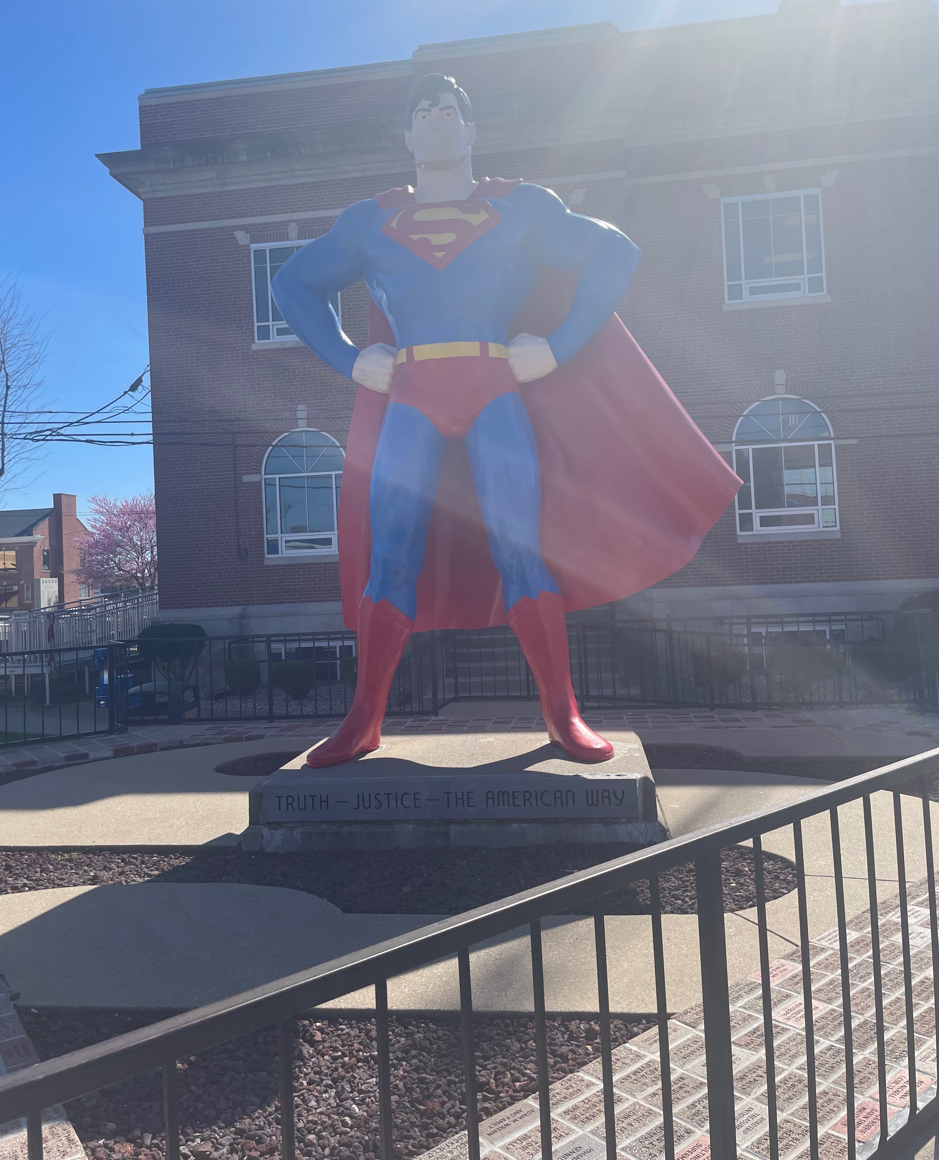 A giant Superman I saw in metropolis, Illinois yesterday. There was a Superman museum right next to it | image tagged in illinois,superman,photography,photos | made w/ Imgflip meme maker