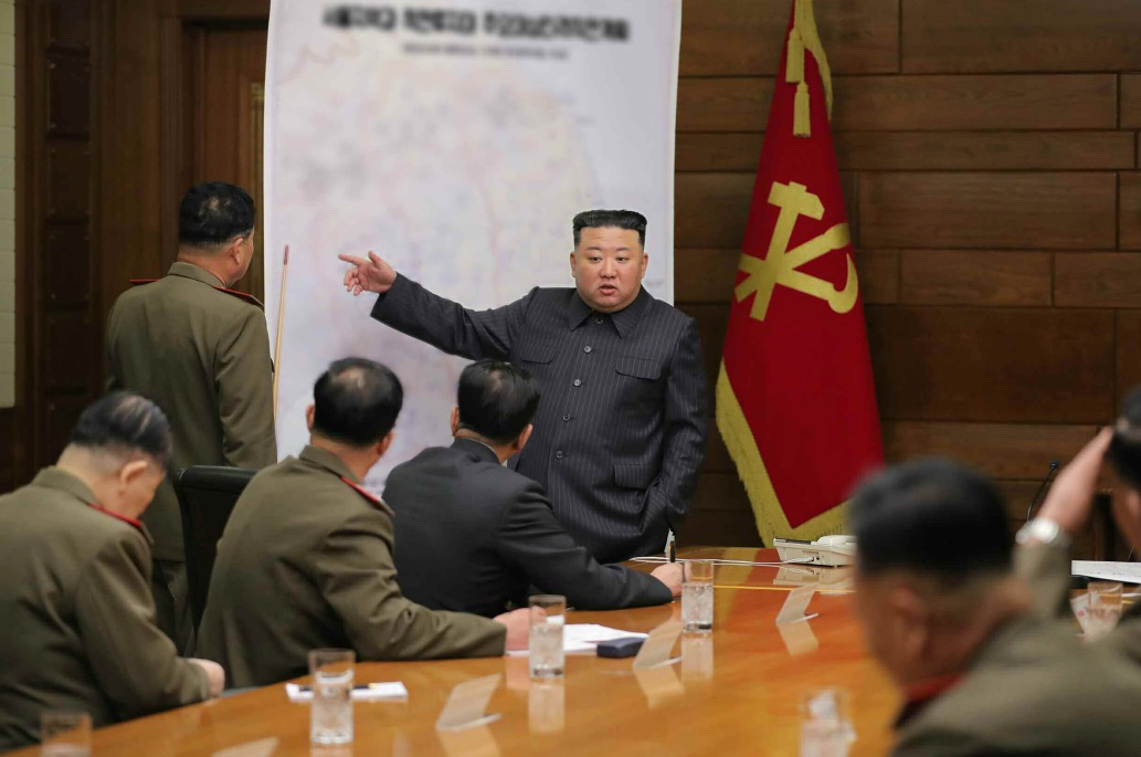 Kim pointing at board Blank Meme Template