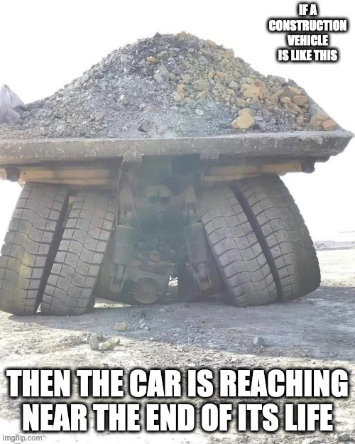 Vehicle With Faulty Axle | IF A CONSTRUCTION VEHICLE IS LIKE THIS; THEN THE CAR IS REACHING NEAR THE END OF ITS LIFE | image tagged in truck,construction,memes | made w/ Imgflip meme maker