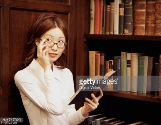 Curious Asian Librarian | image tagged in curious asian librarian | made w/ Imgflip meme maker