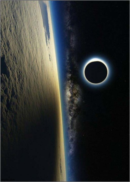 A Solar Eclipse From Space | image tagged in solar eclipse,space | made w/ Imgflip meme maker