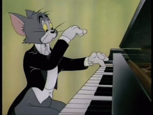Tom playing the piano Blank Meme Template