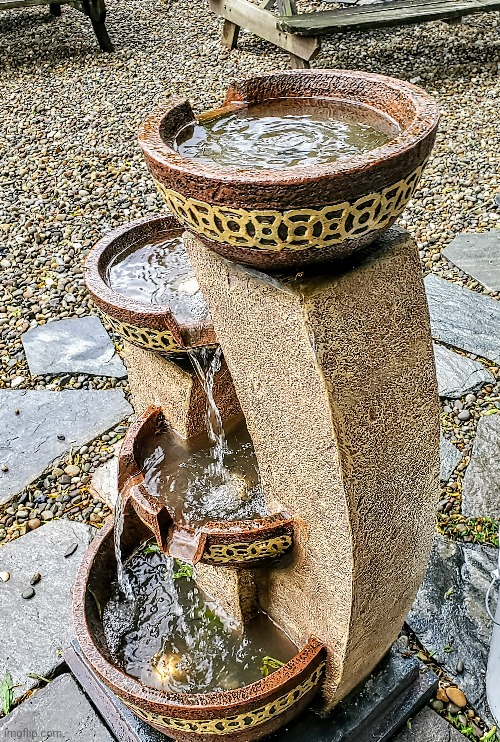 Fountain at a coffee shop | image tagged in photo | made w/ Imgflip meme maker