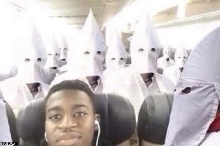 Black guy on kkk flight | image tagged in black guy on kkk flight | made w/ Imgflip meme maker