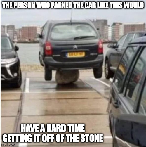 Car on Top of Stone | THE PERSON WHO PARKED THE CAR LIKE THIS WOULD; HAVE A HARD TIME GETTING IT OFF OF THE STONE | image tagged in cars,memes | made w/ Imgflip meme maker