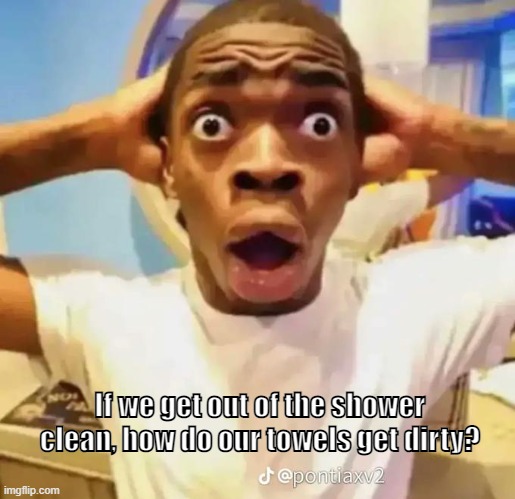 Shocked black guy | If we get out of the shower clean, how do our towels get dirty? | image tagged in shocked black guy | made w/ Imgflip meme maker