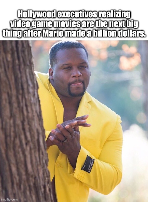Let’s hope they don’t mess this up. | Hollywood executives realizing video game movies are the next big thing after Mario made a billion dollars. | image tagged in black guy hiding behind tree | made w/ Imgflip meme maker