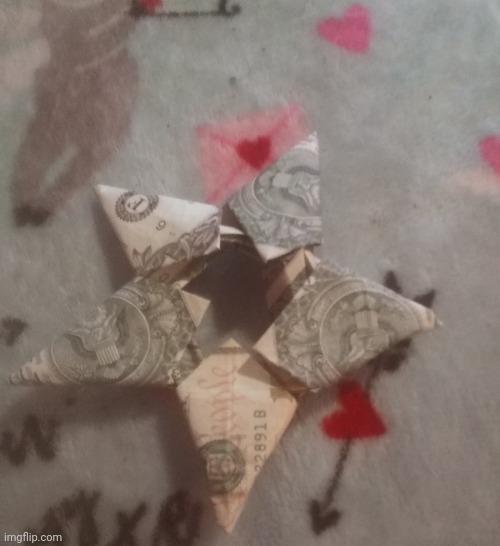 Made a oragami festive star out of 5 dollar bill | image tagged in oragami,festive star,dollar bill | made w/ Imgflip meme maker