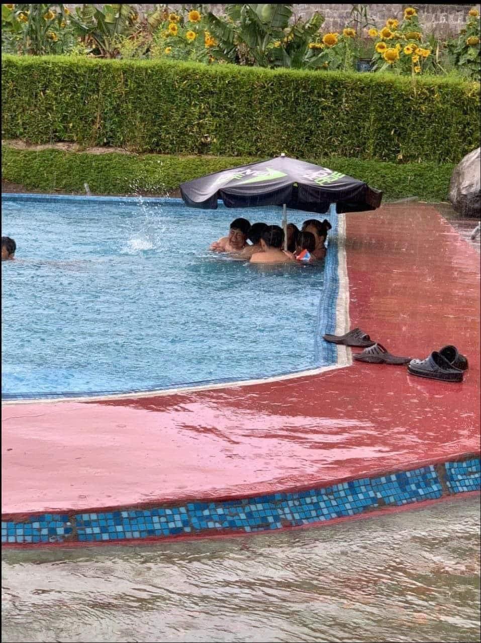 In the pool in the rain Blank Meme Template