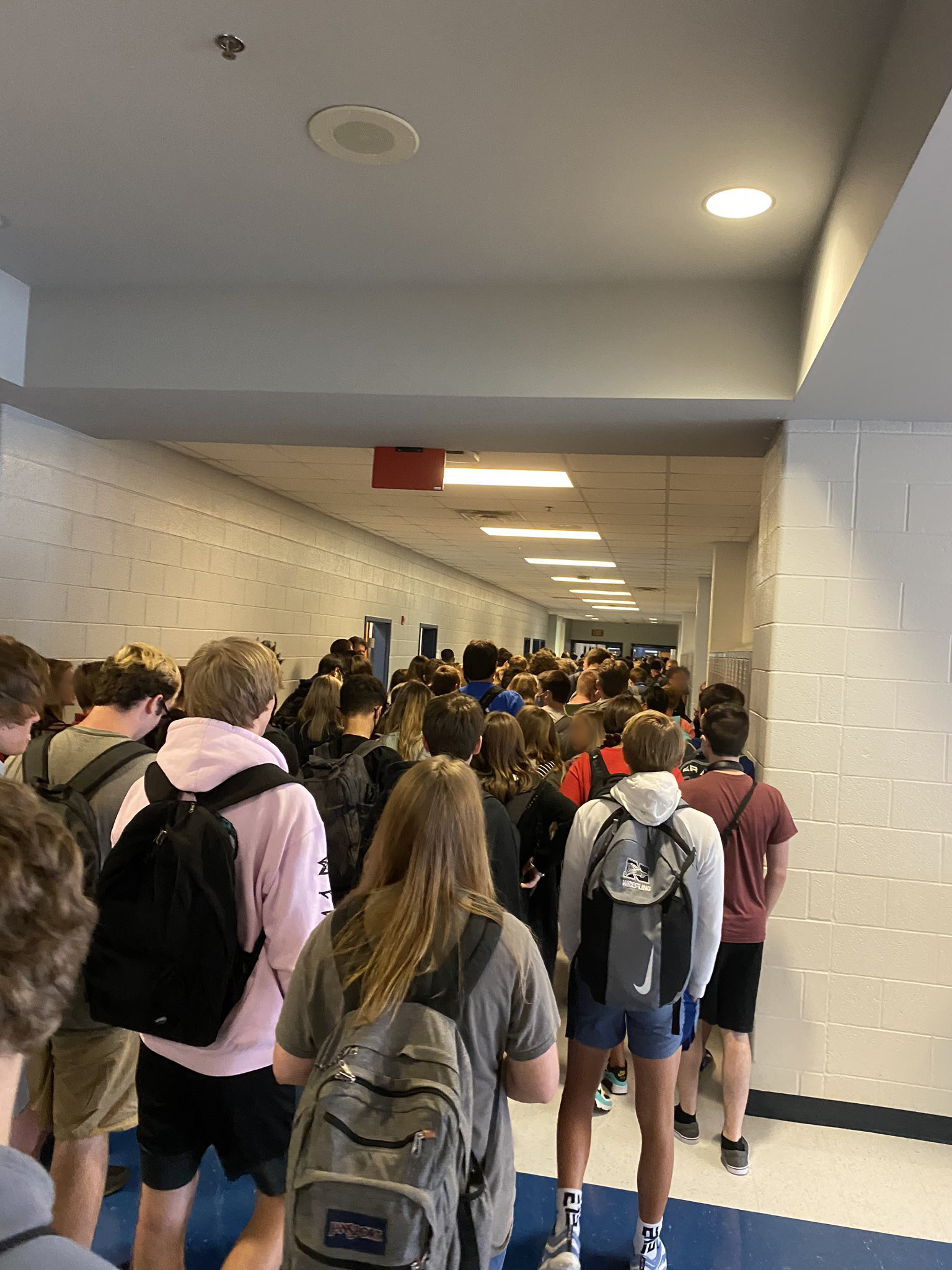 Crowded Hallway Blank Meme Template