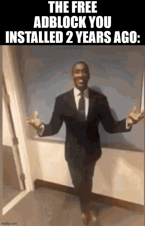 smiling black guy in suit | THE FREE ADBLOCK YOU INSTALLED 2 YEARS AGO: | image tagged in smiling black guy in suit | made w/ Imgflip meme maker