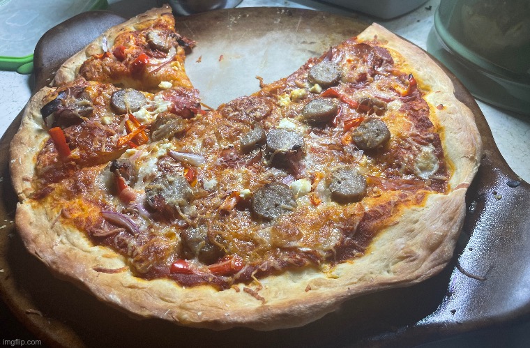Homemade pizza with mozzarella, Parmesan, ham, pepperoni, onions, peppers, feta, and sausage | image tagged in cooking | made w/ Imgflip meme maker