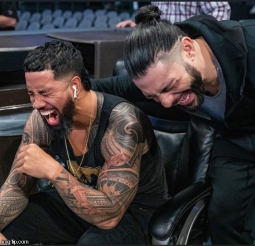 Jimmy Uso and Roman Reigns laughing | image tagged in jimmy uso and roman reigns laughing | made w/ Imgflip meme maker