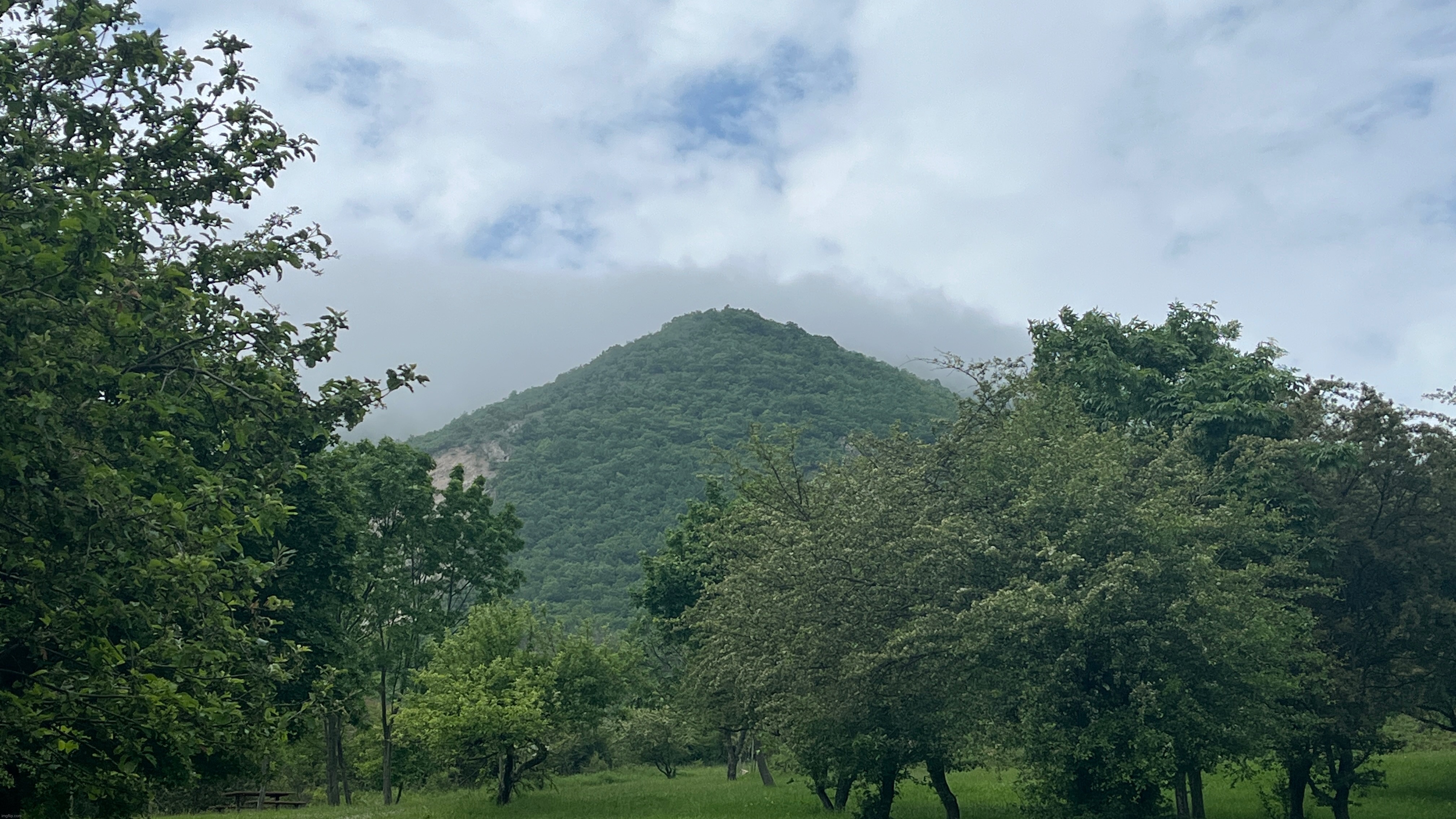 cloud passing over our local mountain (turned out pretty bad tho) | image tagged in share your photos,share your own photos,mountain,clouds | made w/ Imgflip meme maker