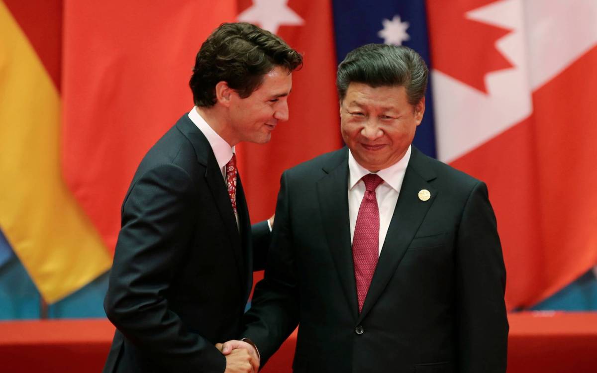 High Quality Justin Trudeau smiling at Xi Jinping Blank Meme Template