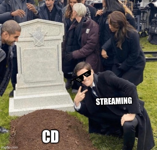 Grant Gustin over grave | STREAMING; CD | image tagged in grant gustin over grave | made w/ Imgflip meme maker